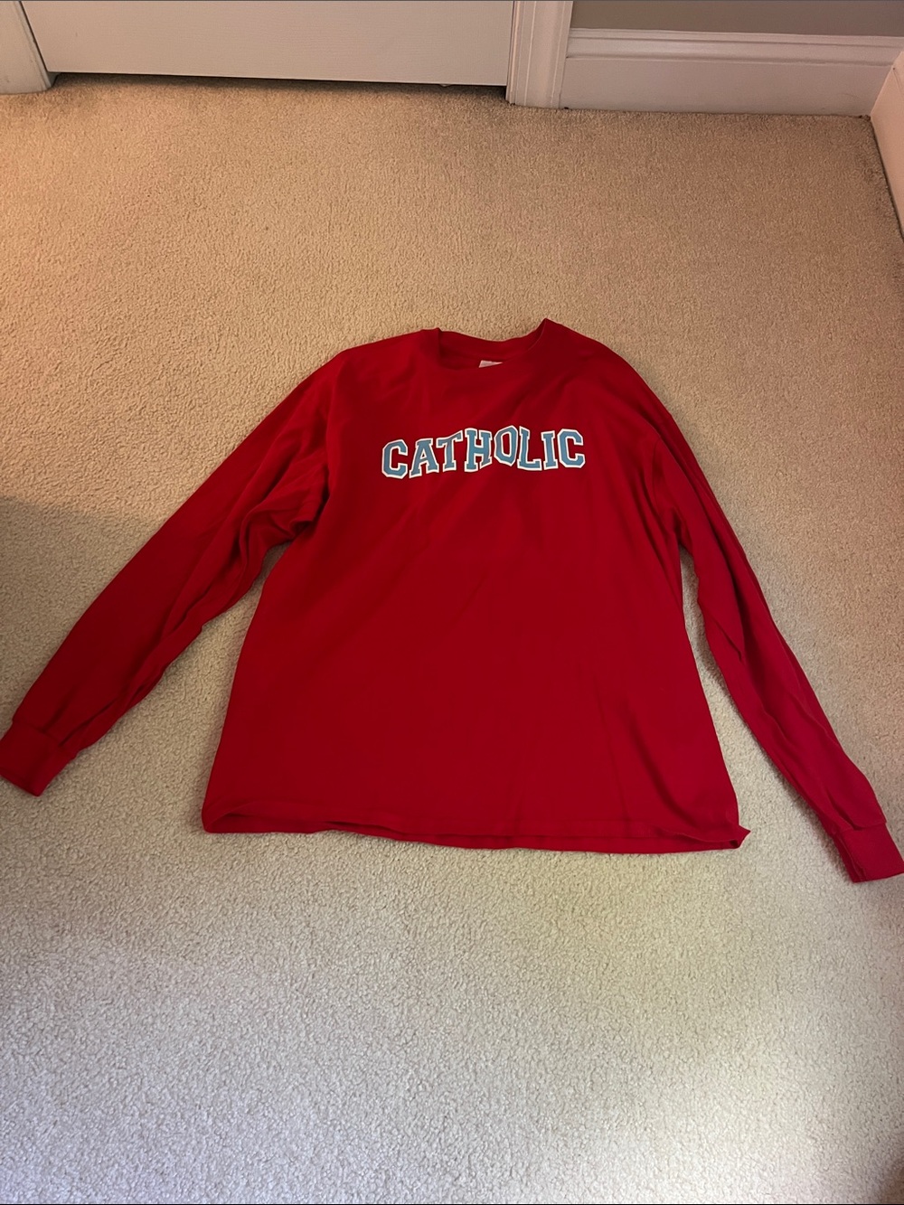 Gildan Red Long Sleeve Tee with 'CATHOLIC' Chest Print
